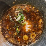 ラーメン龍の家 - 割り粥。無料。ご飯は少量でスープを熱々に温め直してくれる。