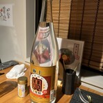 焼鳥 一灯 - 焼酎の1升瓶