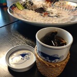 ふく処 さかい - デカい鰭が2枚入っているヒレ酒です。