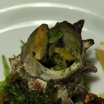 ステーキハウス キッチンリボン - サザエのガーリックバター焼き