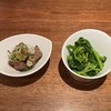 炭火焼専門店 麹庵 - お通し￥400 肝の煮物と菜の花のおひたし