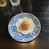 開化亭 - 帆立と雲丹の揚げ餃子
                中にはあっつあつバターソースが