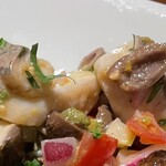 スーペルバッコ - 魚介類とオリーブのマリネ