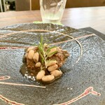 パスト エ カフェ 幸庵 - ●肉料理
      豚肩ロースと白インゲン豆のトスカーナ風白ワイン煮