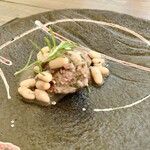 パスト エ カフェ 幸庵 - ●肉料理
      豚肩ロースと白インゲン豆のトスカーナ風白ワイン煮