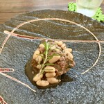 パスト エ カフェ 幸庵 - ●肉料理
      豚肩ロースと白インゲン豆のトスカーナ風白ワイン煮