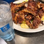 骨付きカルビ酒場 ○き - 米焼酎ソーダ割りに合わせます