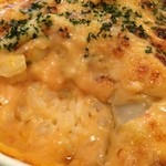 ル・ブラン - 下に敷かれたご飯は白い。でも上にかかった魚介の効いたソースで、濃厚で深い味わいに！