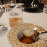 Azurmendi - IBERIAN PORK, TROTTERS ravioli on pork tail juice