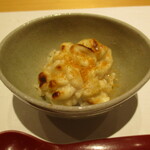 297420891 - 白子：オーブンでタラの白子の表面に焼き色を付けて、その上から 唐墨をタップリ削ってあります。下のごはんと混ぜてリゾット風に美味しくいただきます ♡