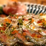 あじのマイケル - 美しく盛られた 鯵のカルパッチョ は見た目も美味しい♪