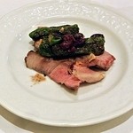 オステリア・オ・ジラソーレ - 熟成豚のロースト　ナポリ種のししとうとオリーブのソース