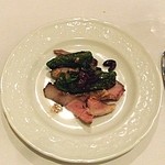 オステリア・オ・ジラソーレ - 熟成豚のロースト　ナポリ種のししとうとオリーブのソース