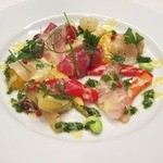 Fresh fish carpaccio with Greek marinated seasonal vegetables and tapnade sauce