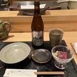 しおや - 瓶ビール、お通し （塩鰹刺し身）