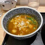 麺屋一燈 - つけ汁内(鳥つくね2個、メンマ、刻み葱)