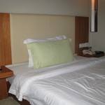 山水时尚酒店 - ベッド