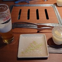 肉料理 KOJIRO - お通し。牛だしの効いた茶わん蒸し。