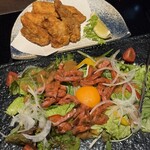 茨城地産地消の店 あんこう鍋×常陸牛 全席個室 もんどころ - 常陸牛ローストビーフのユッケサラダ
            とあんこうの唐揚げ