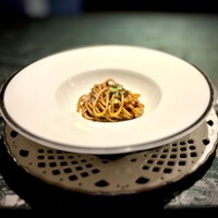 SALONE 2007 - 追加注文）インサルサ…じっくり炒めて作った伝統的なソース｡世界一の称号を勝ち取った弓削シェフのスペシャルレシピ｡パスタはオリジナル麺でもちもちした食感です。