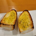 長原バル Co-Lab - お通し　ガーリックトースト