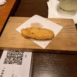 地酒と道産食材 一笑 本店 - 付きだし　ニシンのカツ１つ食べた後