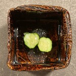 NOMI RESTAURANT - A cucumber that doesn't realize it's being cut