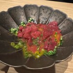 博多牛もつ鍋 なの川 - 桜ユッケ　かき混ぜた後