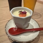 博多牛もつ鍋 なの川 - お通し　明太子乗せ茶碗蒸し