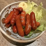 炭火焼と酒 かるぼ - 懐かしの赤ウィンナー焼