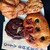 THE CITY BAKERY - 料理写真:左上：プレッツェルクロワッサン、右上：メープルベーコンビスケット、左下：ダブルチョコレートクッキーNY、右下：オリーブとドライトマトのフォカッチャ