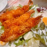 ビストロ アン ファミーユ - ジャガイモで巻いた海老のフリット　ケイジャンスパイス