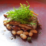 マダム・トキ - 魚料理は太刀魚とホタルイカのムニエル。こがしバターとペッパーのソース。上には水菜が。