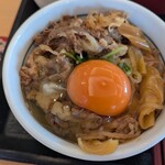 なか卯 - 牛すき丼に卵を入れました