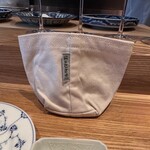 やまぐち - 一澤信三郎帆布の袋に入った温かいパン