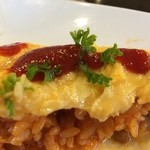 たいめいけん - 専用のケチャップをかけて、パセリを散らしていただきます。