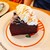 パティスリー ニコリ - 料理写真:ガトーショコラ　上には生クリームとシナモン