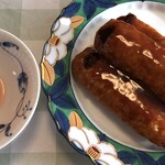 銀座惣菜店 - つくね串を月見で。