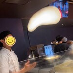 マレーシアパビリオン - 隣の人に生地をパスしてたよ