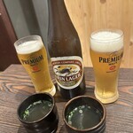 明日のためのしじみばか 泉店 - 二軒目なので瓶ビールで乾杯！お通しはしじみのスープ。外雨で寒かったから温かいスープはかなり嬉しかったです。