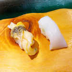 うまい鮨勘 - 活つぶ貝（￥238）、真いか（￥76）。つぶ貝はパリパリ、新鮮な歯応え！