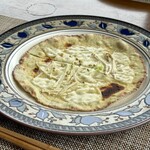 石臼挽き蕎麦香房 山の実 - 須賀川そばピッツァ(信州みそ、ねぎ、えのき、蕎麦の実、山椒)