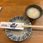 吉﨑食堂 - お通しはゆし豆腐です