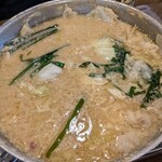 博多もつ鍋 徳永屋 - もつ追加後のスープ