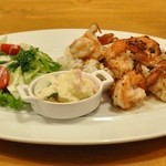 Hawaiian Cafe & Dinner Cocotier - 特製ガーリックバターでさっと炒め、五穀米にのせて一緒にお召し上がりください。