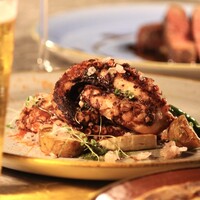 タコの豪快ステーキ ハーブヴィネグレット