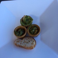 メインダイニング シーホース - 志摩コースの前菜。貝の香草焼き
