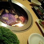 Nishiki Henkotsu - 鉄板じゃなくて網でした。チシャ菜はサービスでした。