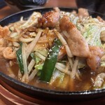 大衆酒場 みやにしテツオ - 鉄板のコゲが香ばしい