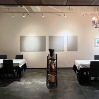 イル コラッツィエーレ - シェルフで仕切った半個室